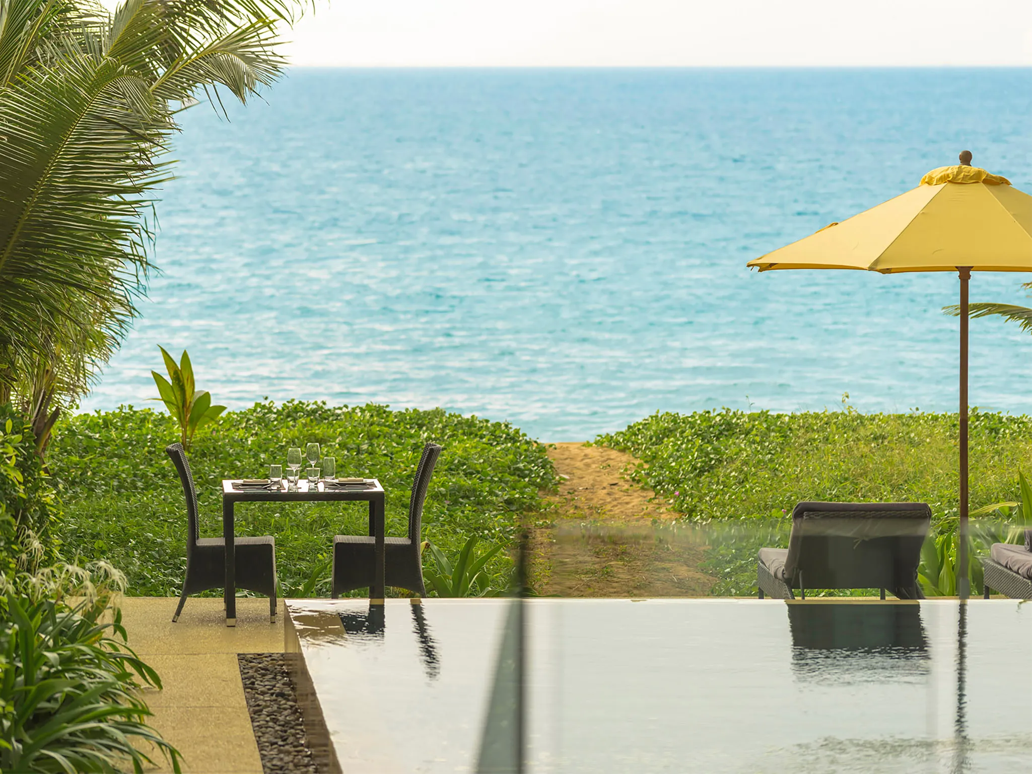 Infinity Blue Phuket - Outdoor dining with ocean view