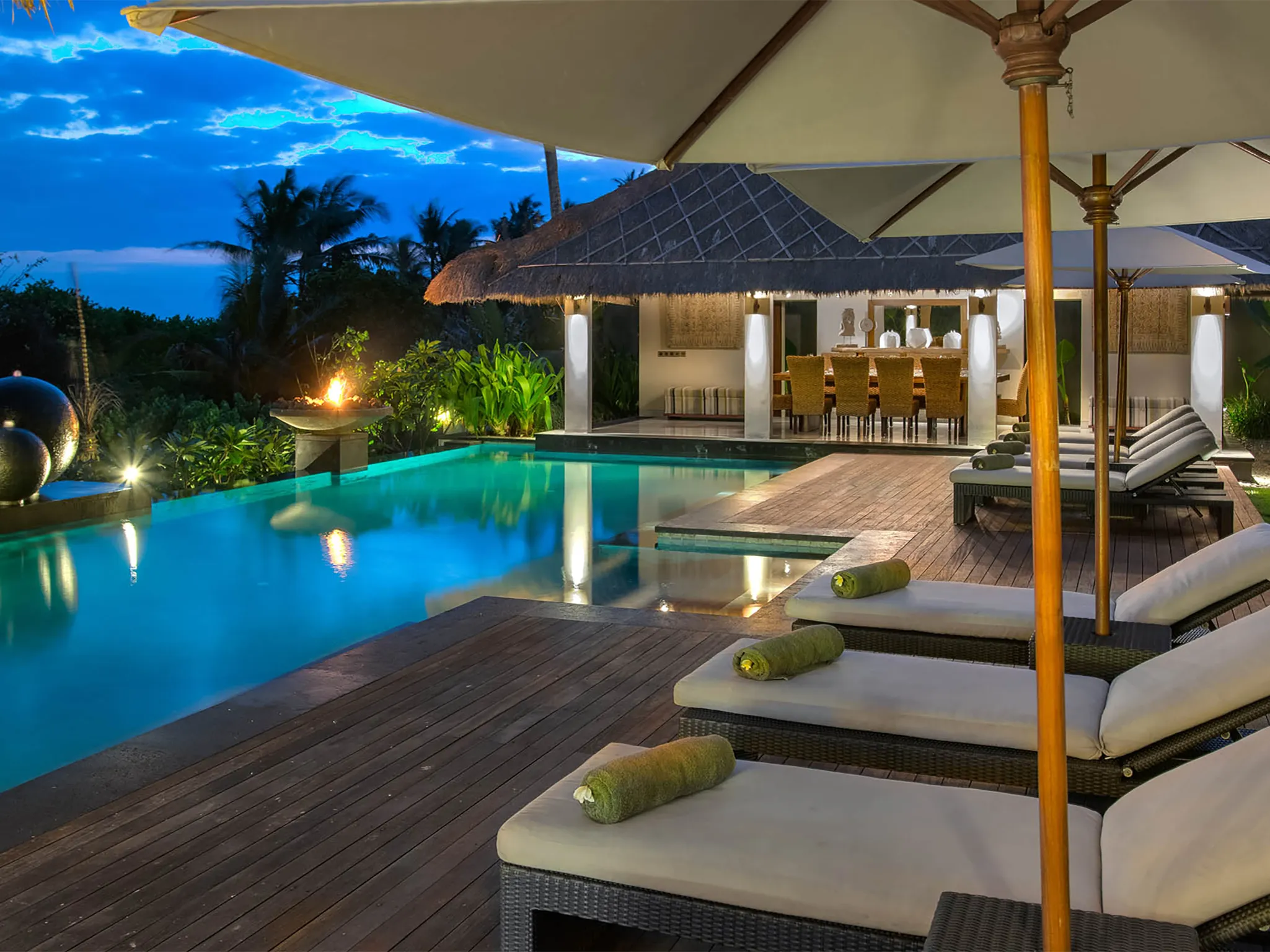 Seseh Beach Villa I - Poolside at twilight