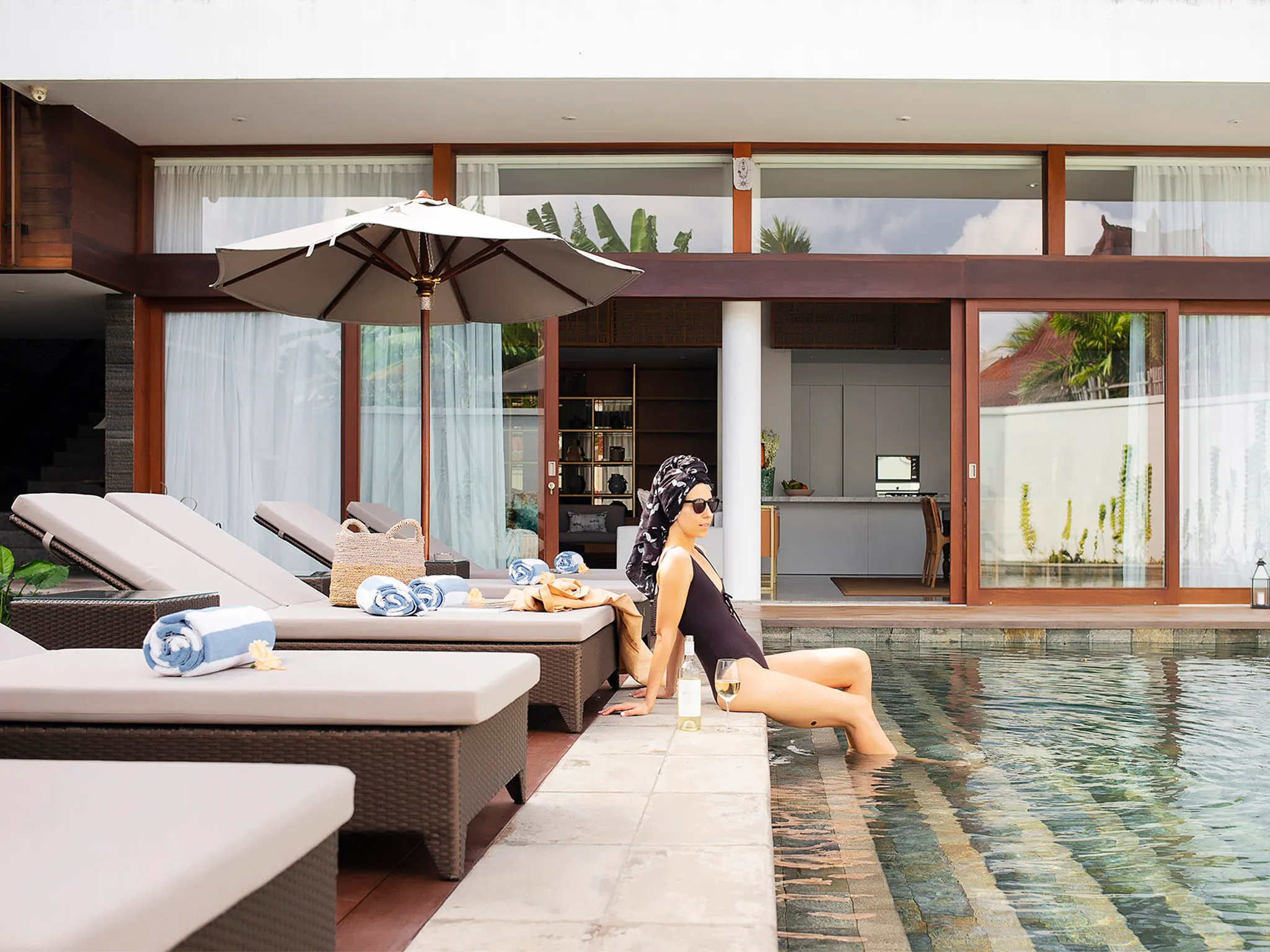 Villa Indrani - Sunloungers and the pool