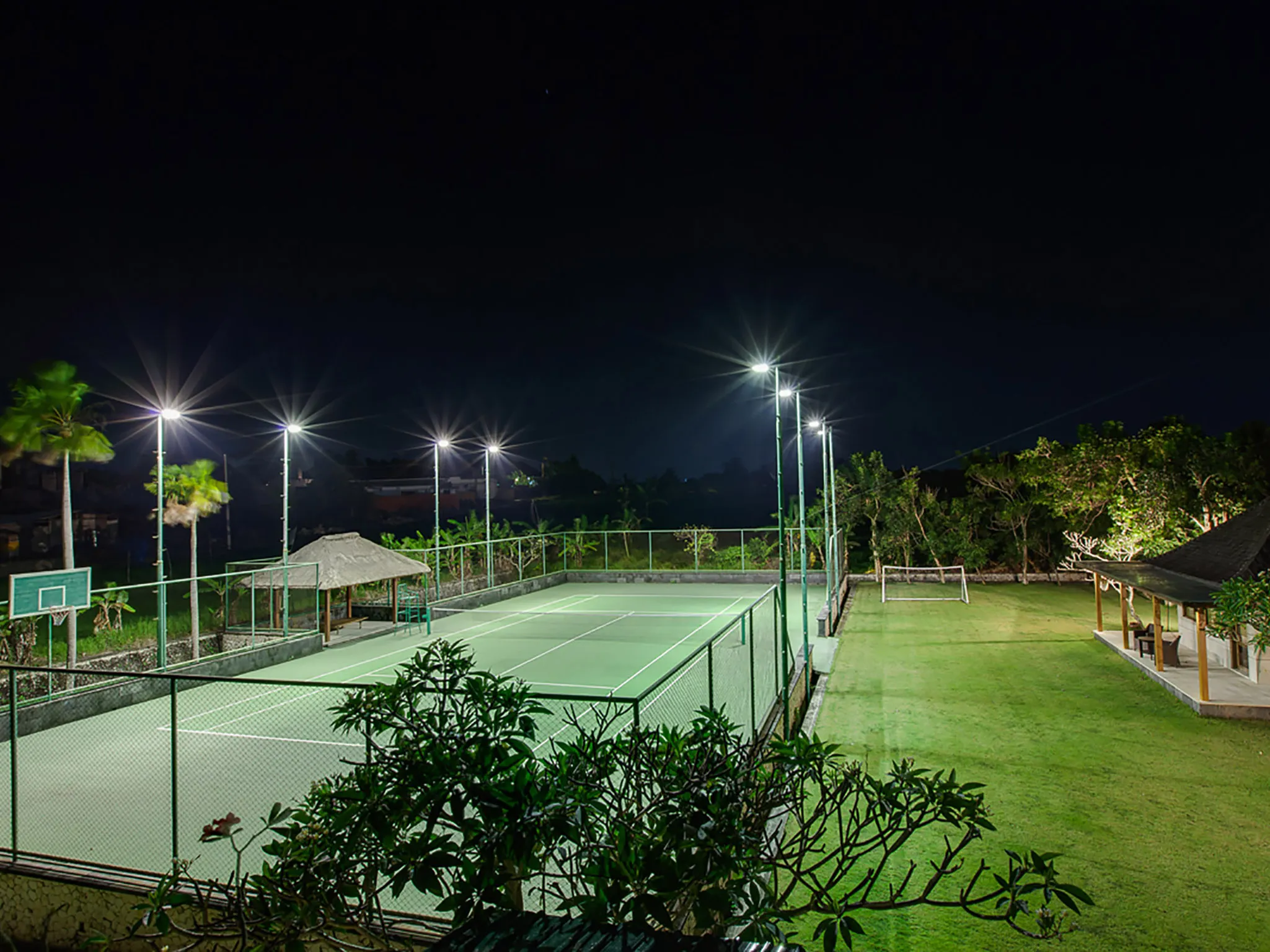 The Beji - Tennis court at night