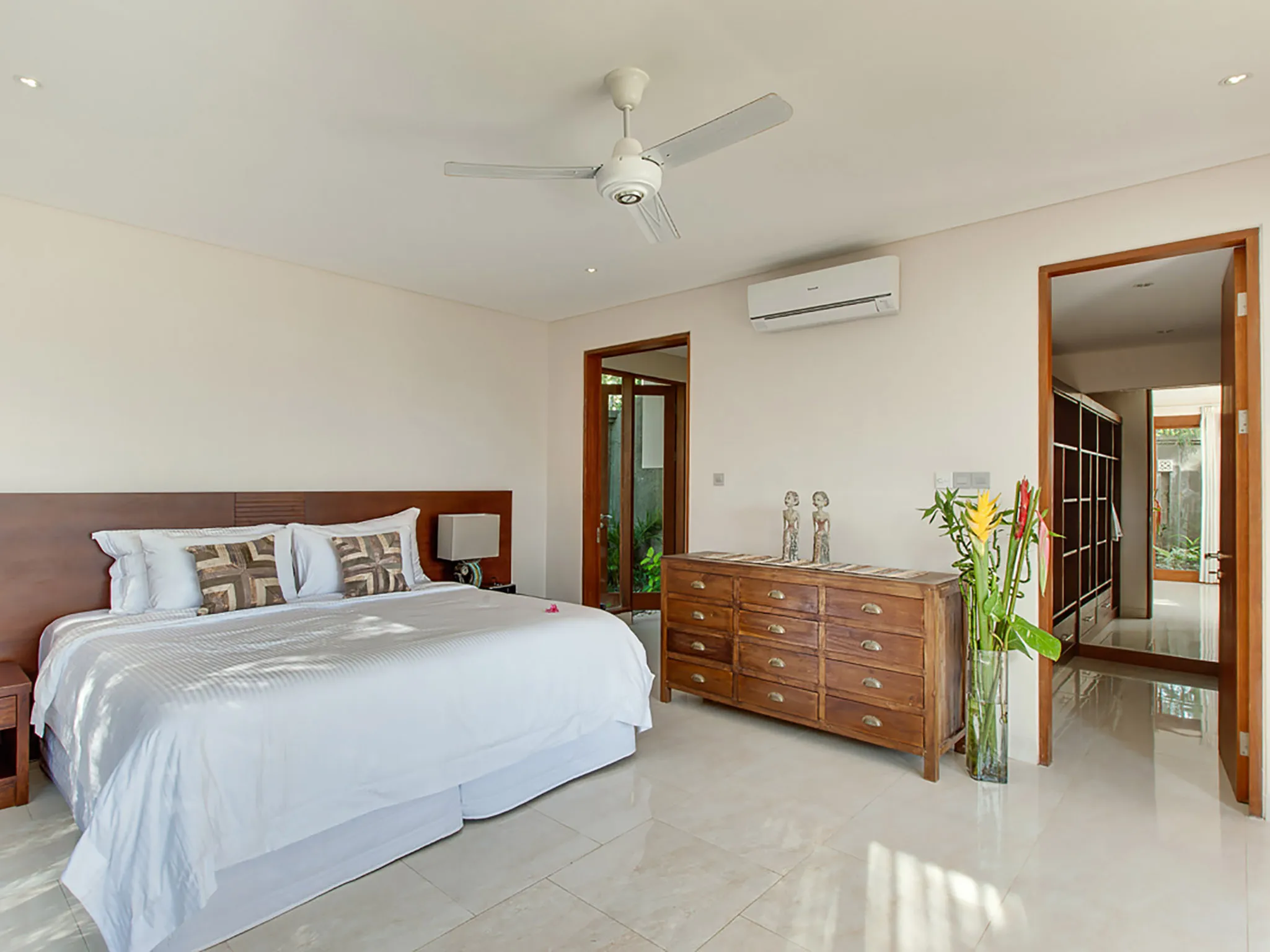 Villa Tirta Nila - Downstairs guest bedroom interior with walkin cabinet
