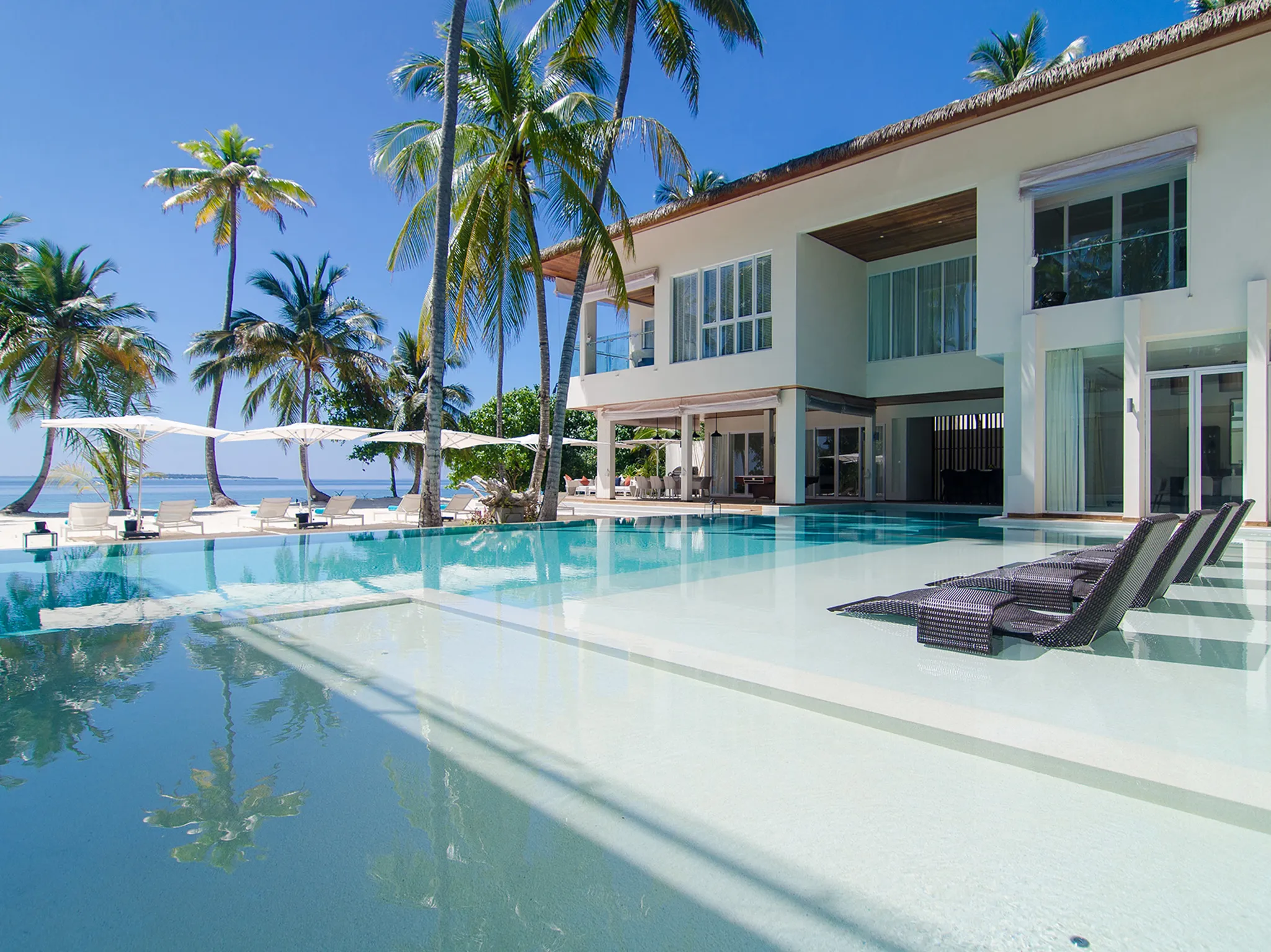 The Amilla Villa Estate - Luxuriate poolside