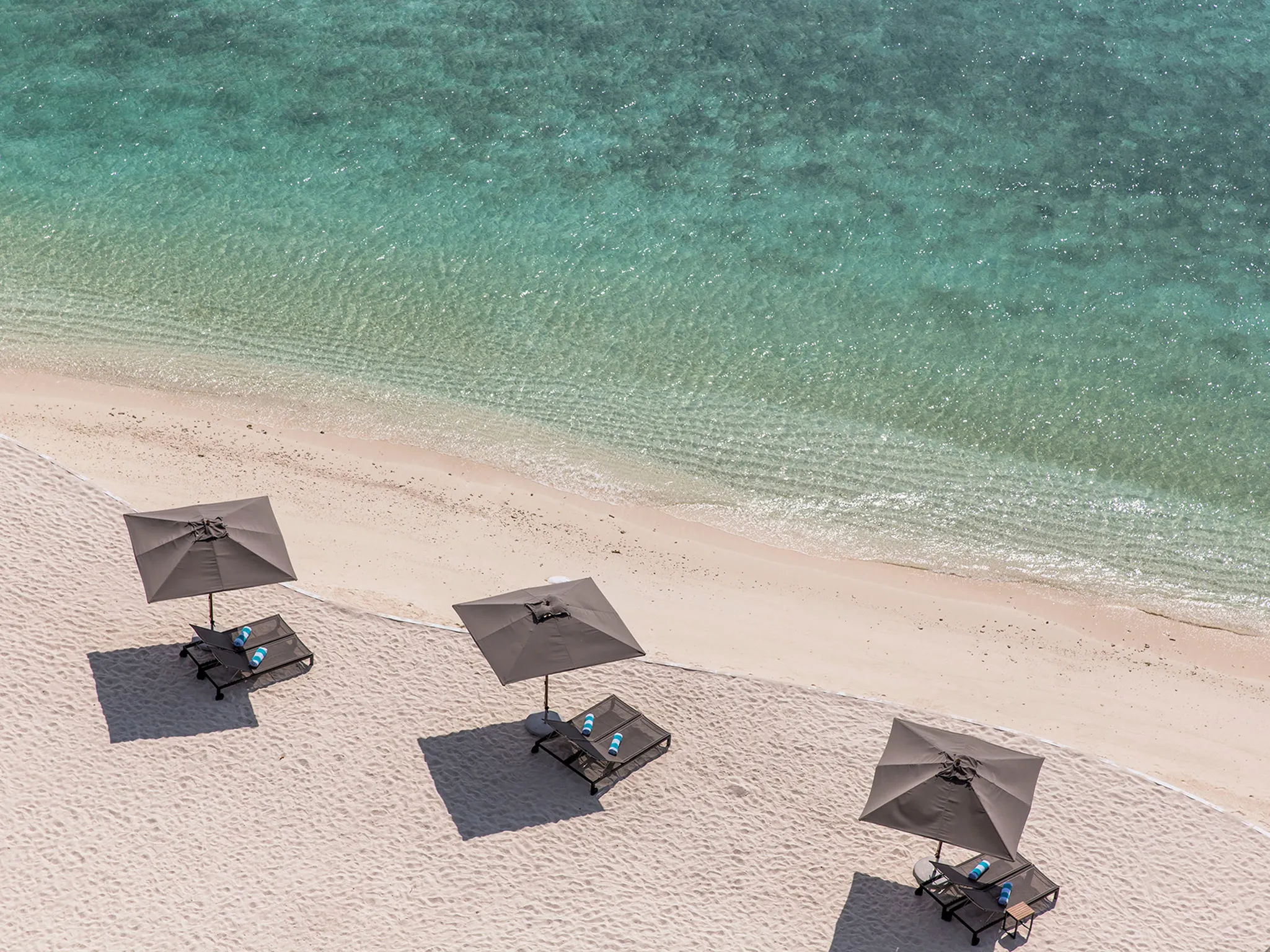 The Amilla Villa Estate - Beach umbrellas