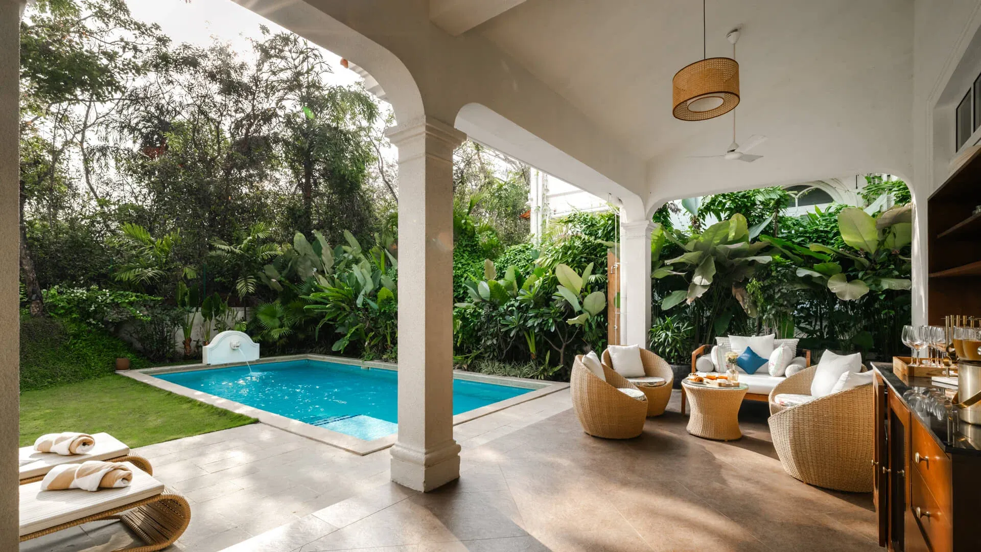 Pool with outdoor Seating Area | Calisto Villa B by Lohono Stays