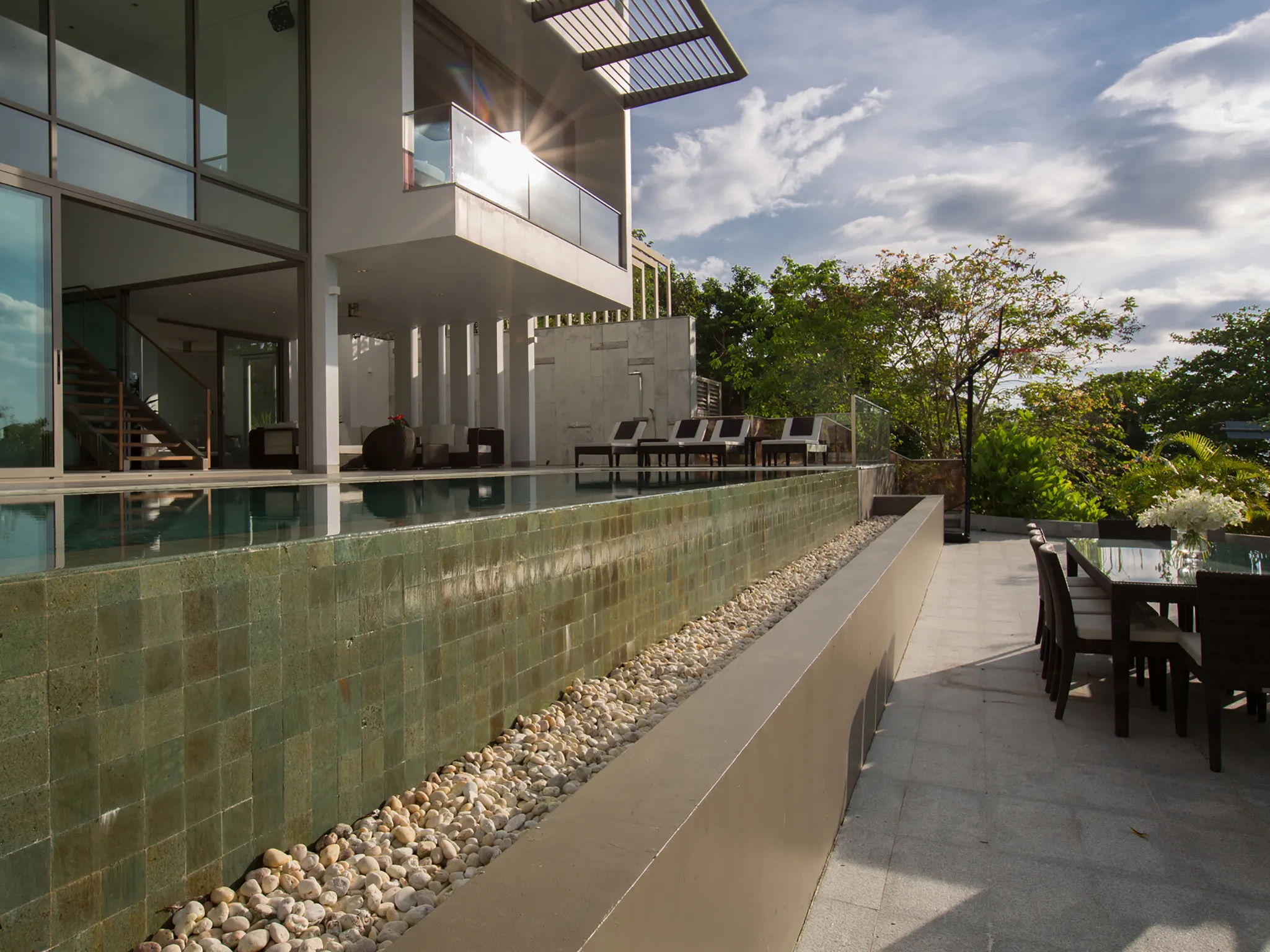 Malaiwana - Patio Duplex - Villa facade by sunset