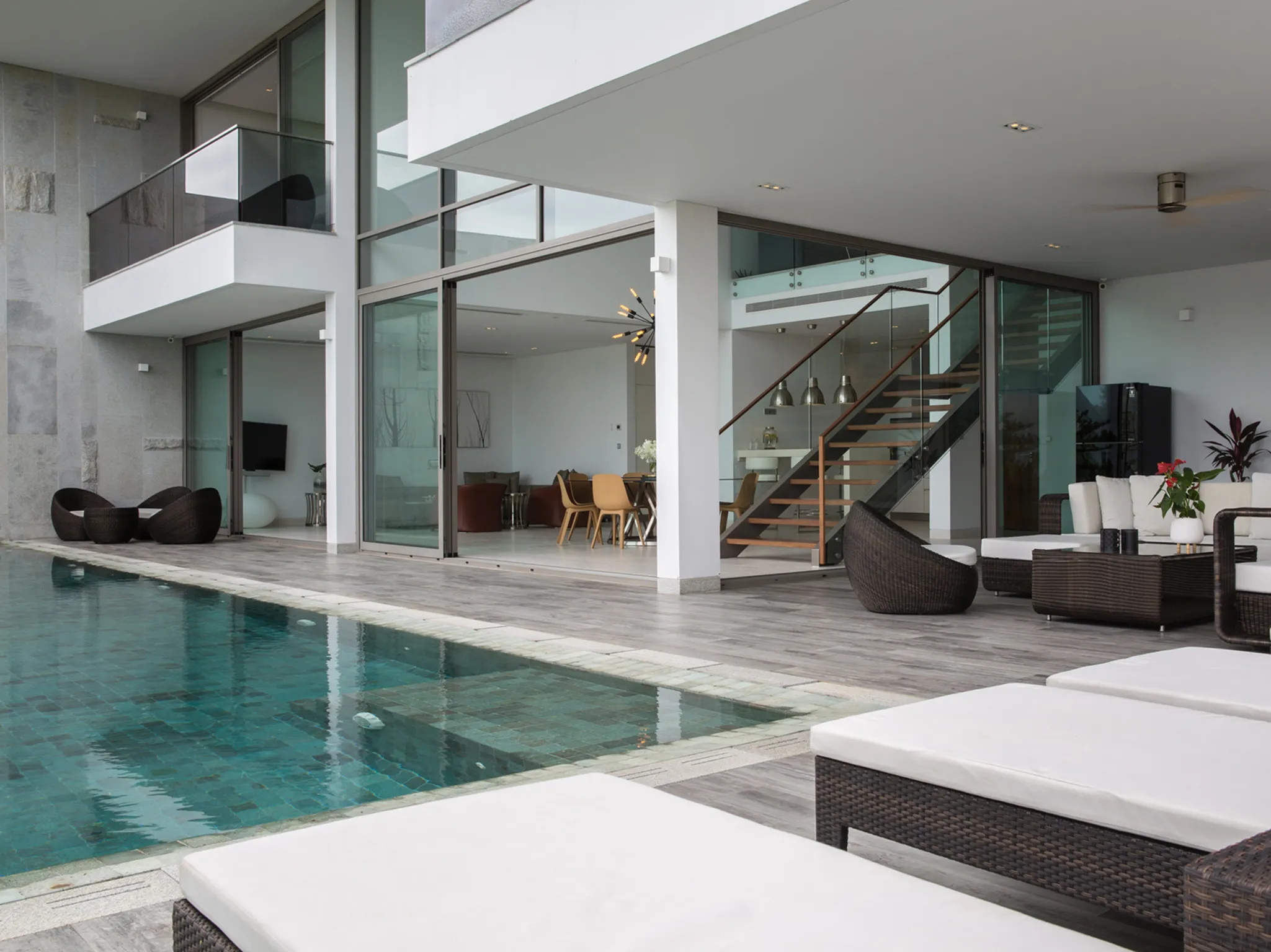 Malaiwana - Patio Duplex - View of the living from the pool