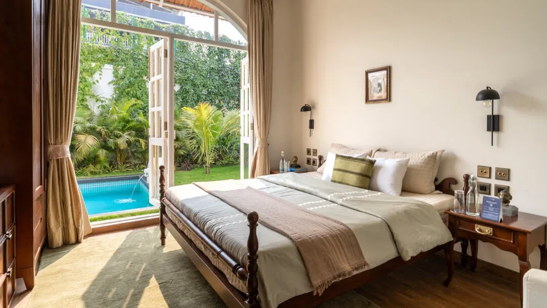 Bedroom with Pool View | Mila Villa 5 by Lohono Stay