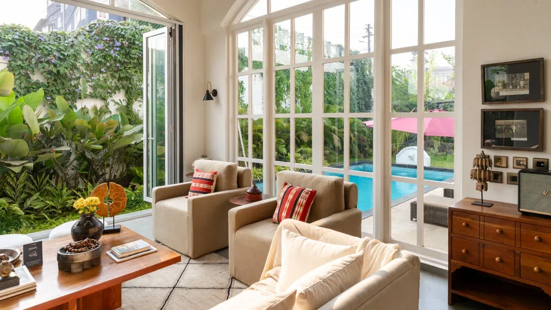 Living Area with Pool View | Mila Villa 5 by Lohono Stays