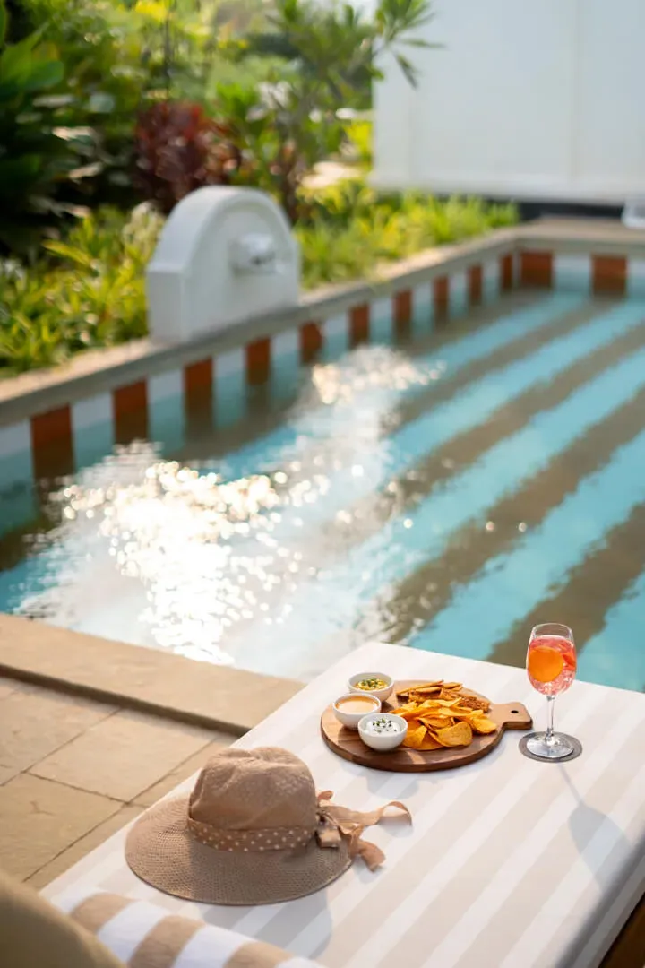 Poolside Seating Area | Mila Villa 6, Goa by Lohono Stays