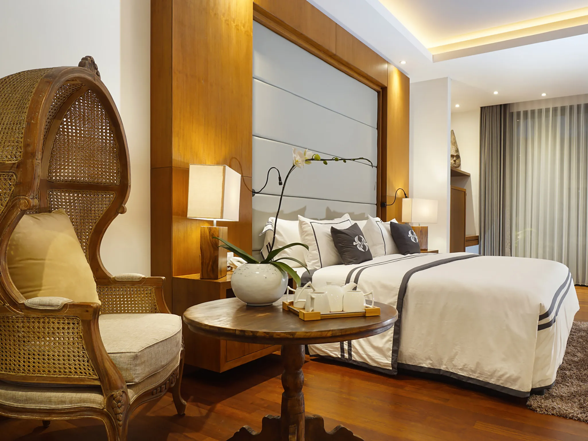 Tirtha Bayu Villa II - Deluxe Suite 2 with rattan chair