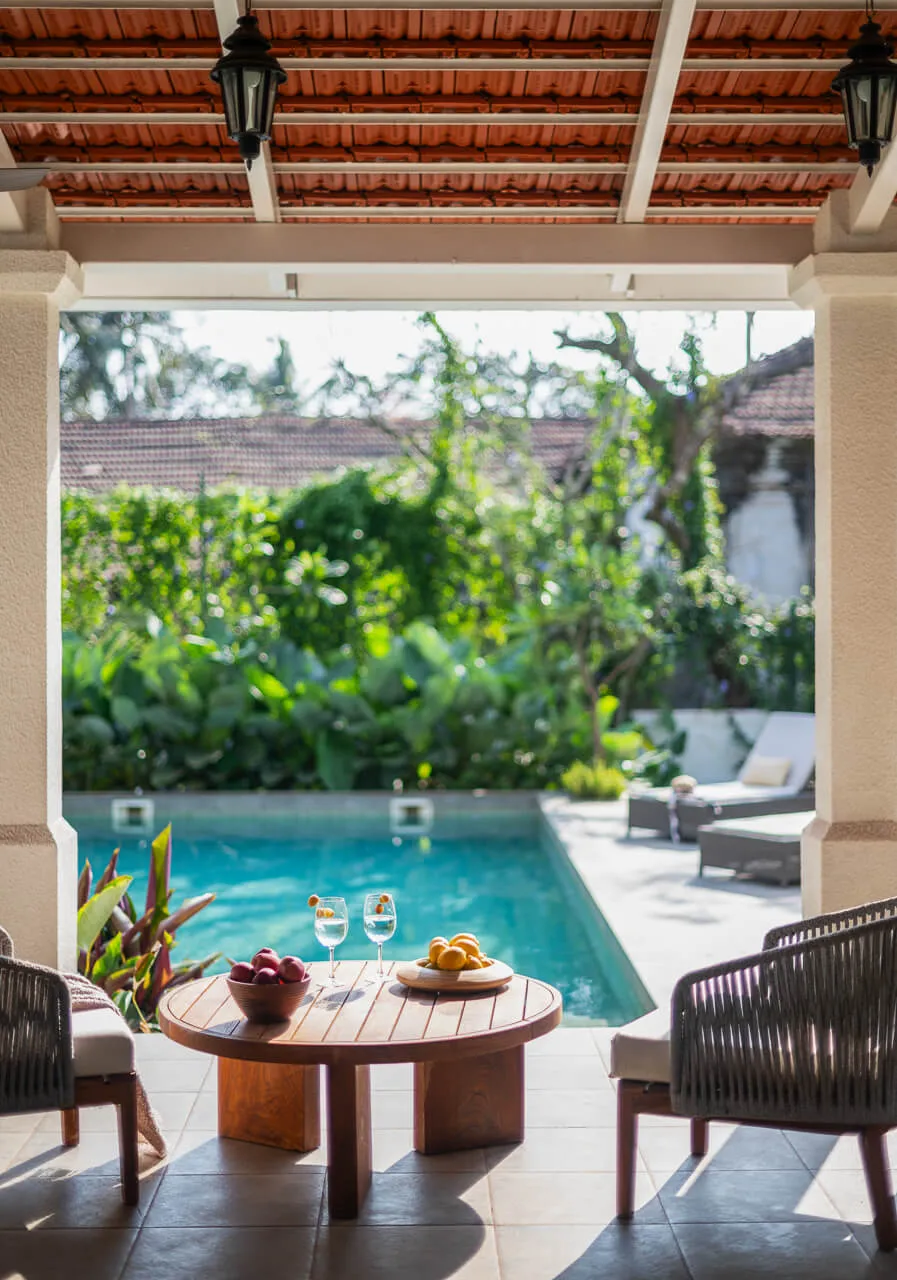 Outdoor Seating at Pool | Estate De Carmo by Lohono Stays