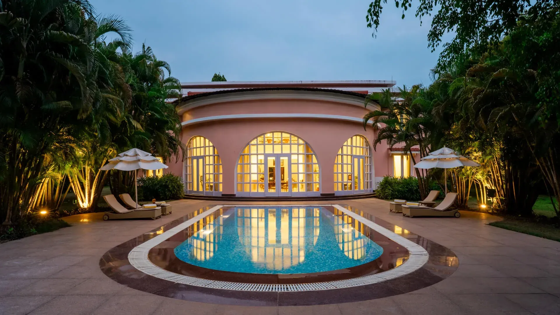 Night Poolside Facade | Villa Palladio  | Lohono Stays