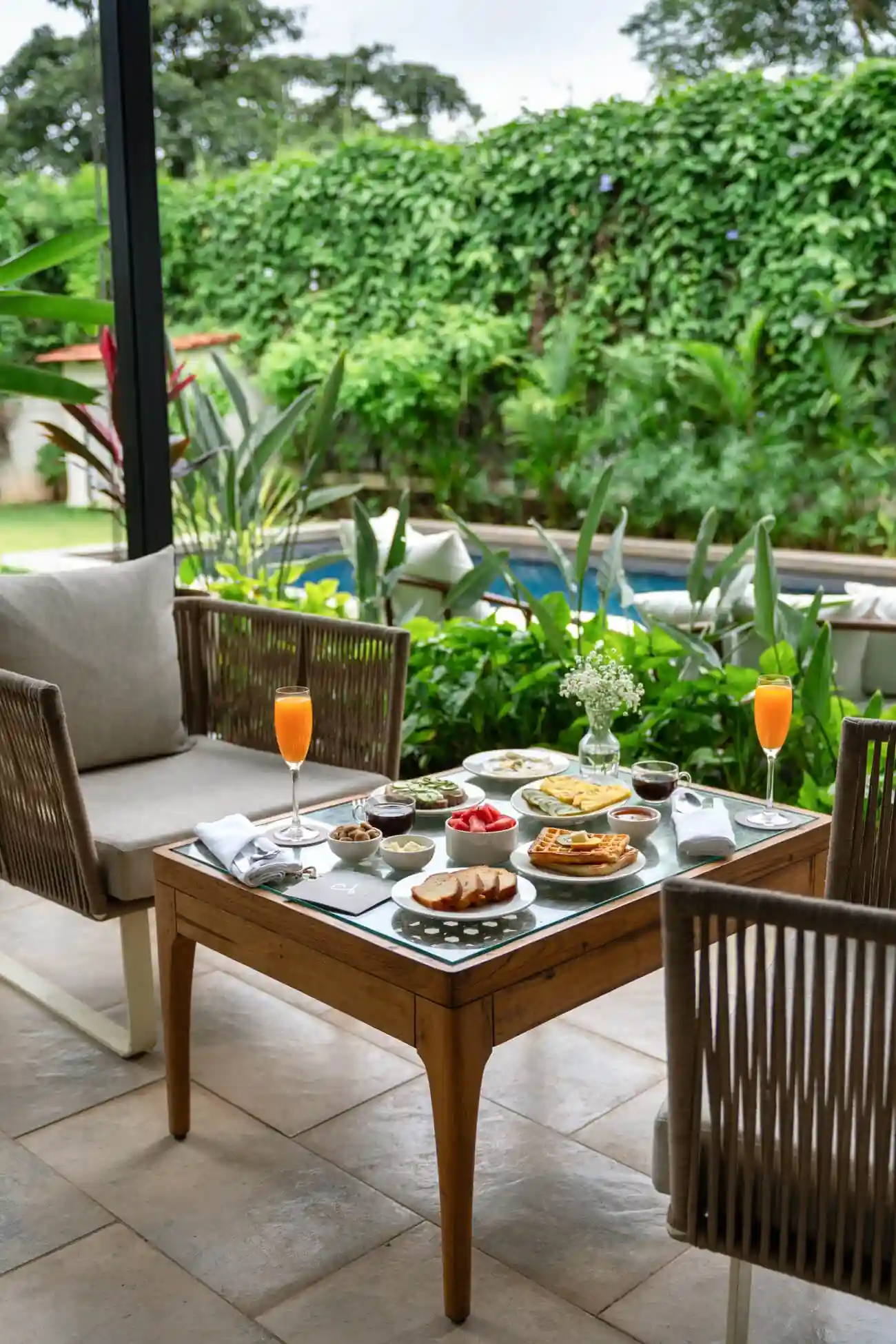 Poolside seating | Siena Villa B by Lohono Stays