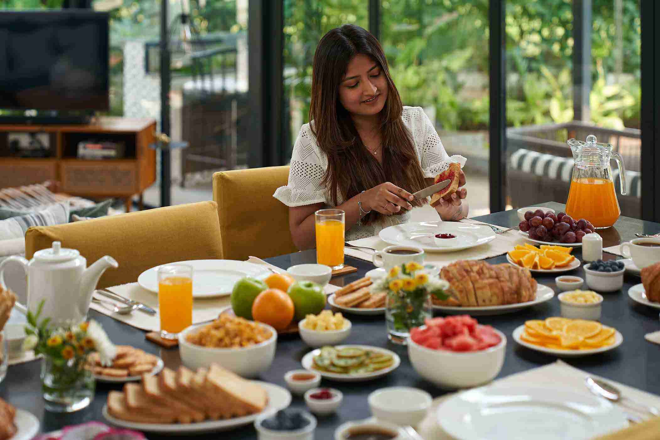 Woman eating breakfast - Sienna | Lohono Stays