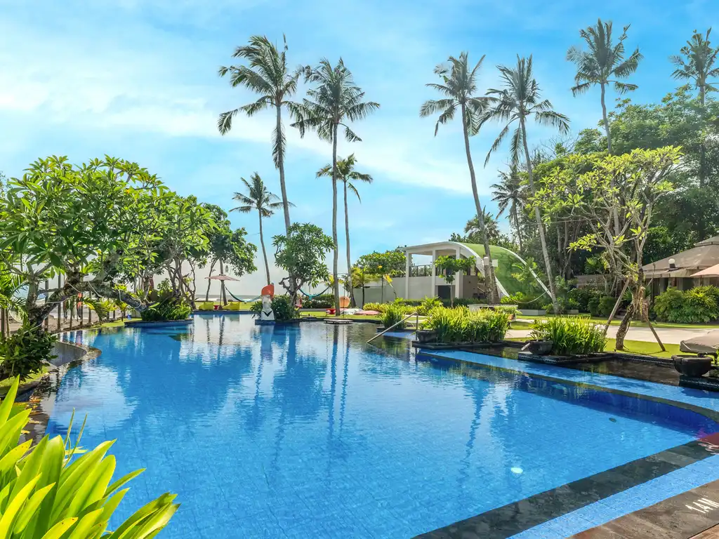 Elite Havens - Kiss Bali Beach Residence - Bali -  Indonesia - Expansive pool and lawn area