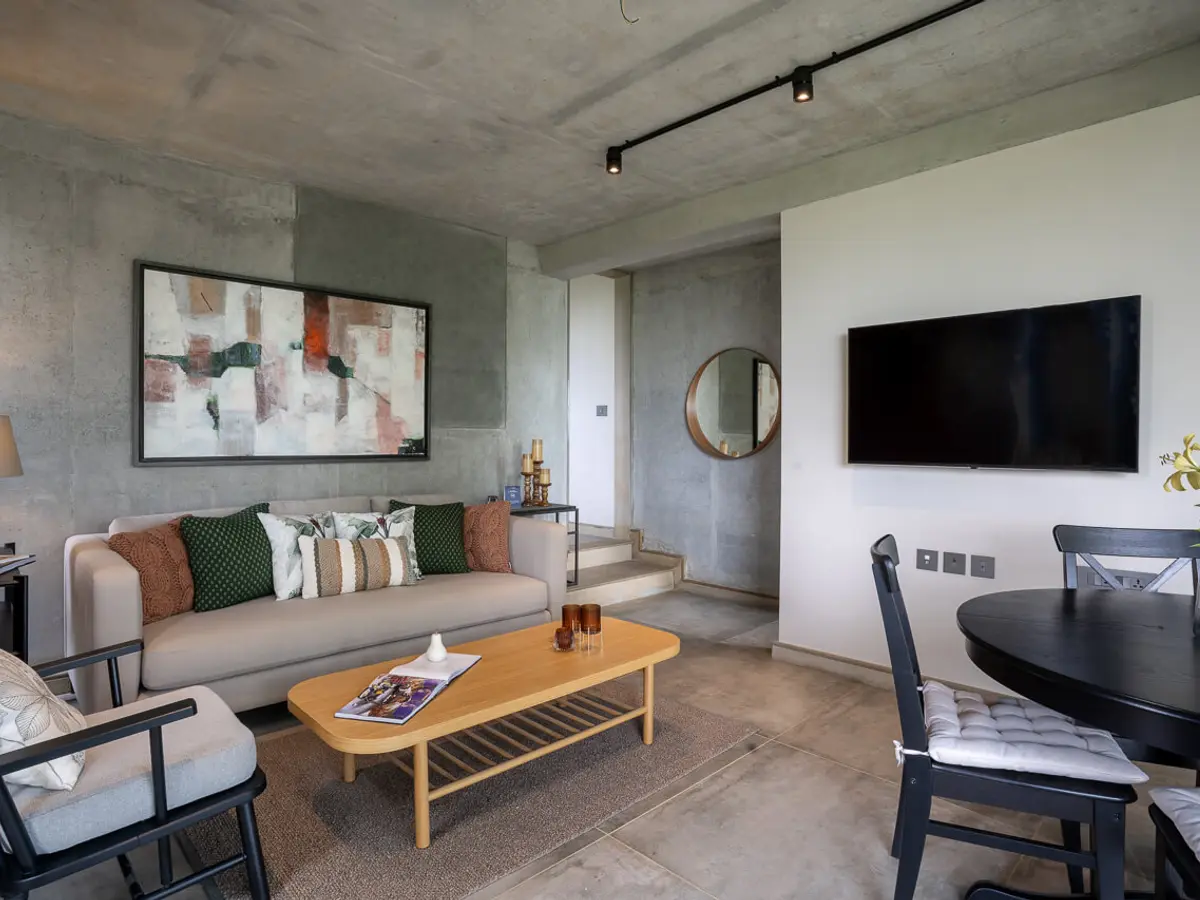 Living Area & Dining Area | Amani Villa 8A by Lohono Stays