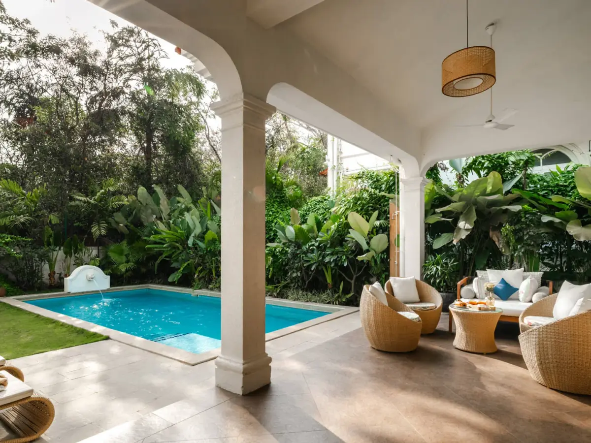 Pool with outdoor Seating Area | Calisto Villa B by Lohono Stays