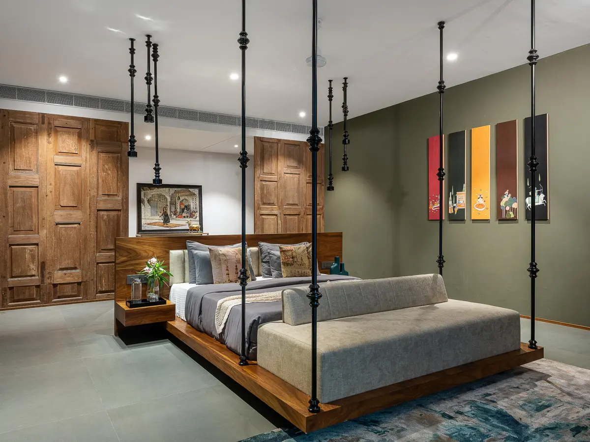 Bedroom with tasteful decor- Lohono Stays