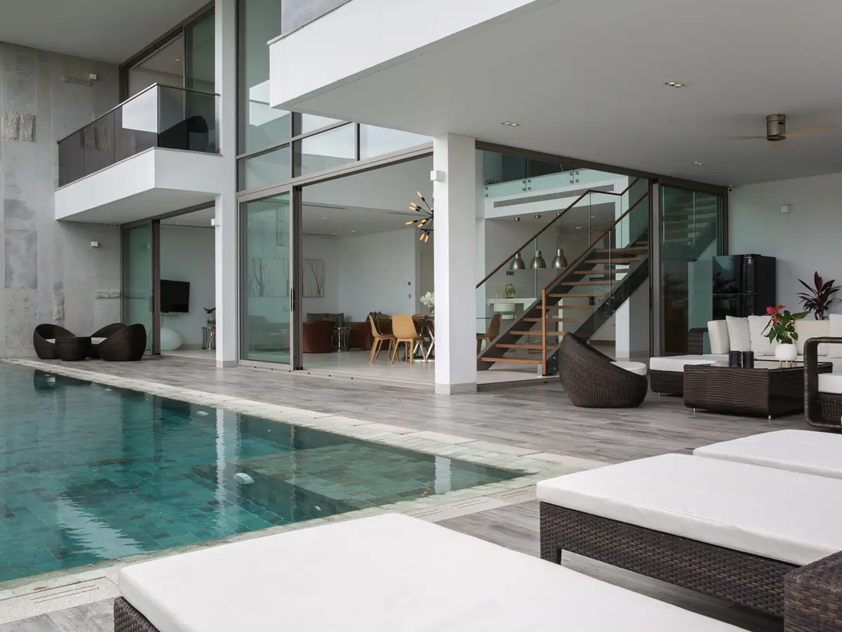 Malaiwana - Patio Duplex - View of the living from the pool