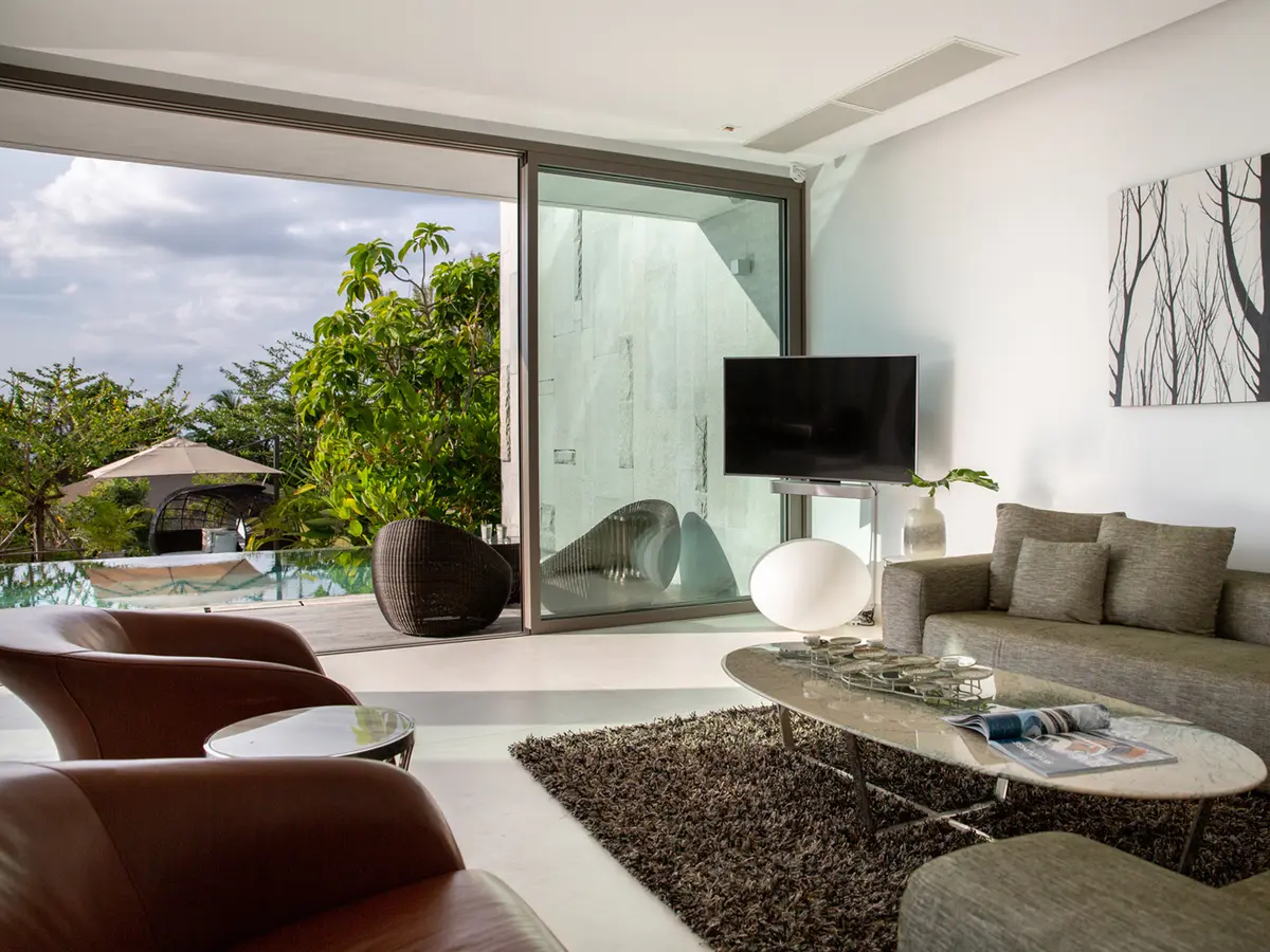 Malaiwana - Patio Duplex - Living room and pool view