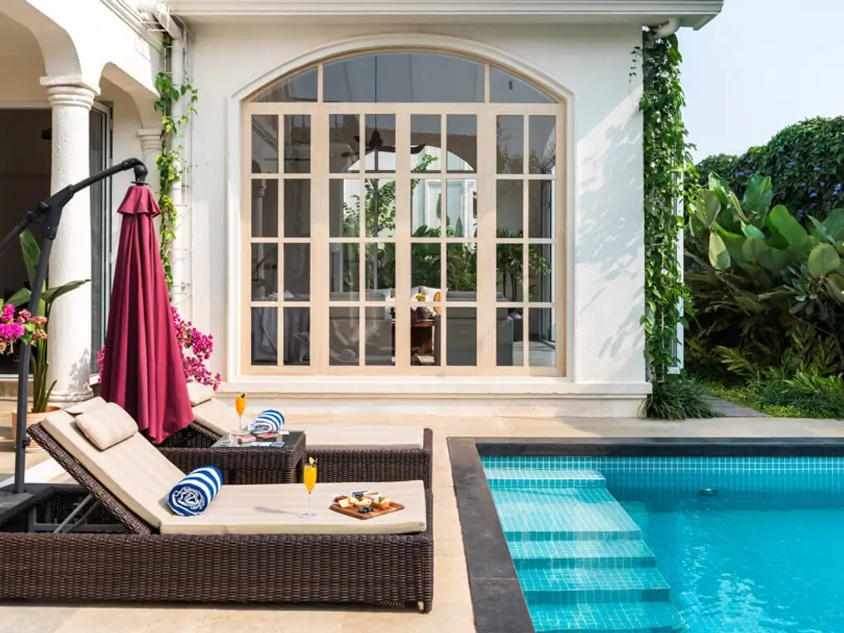 Poolside Seating Area | Mila Villa 5 by Lohono Stay