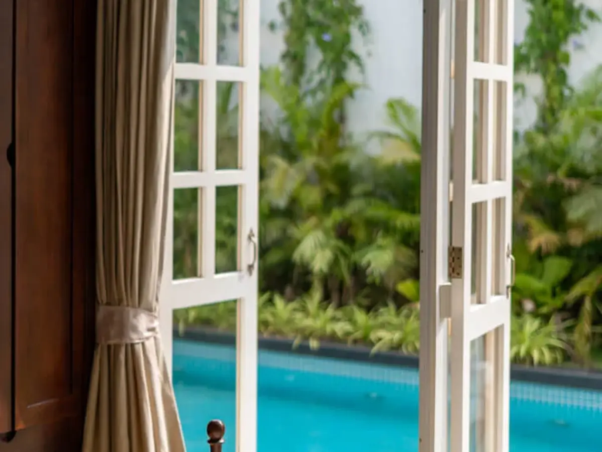 Bedroom with Pool View | Mila Villa 5 by Lohono Stay