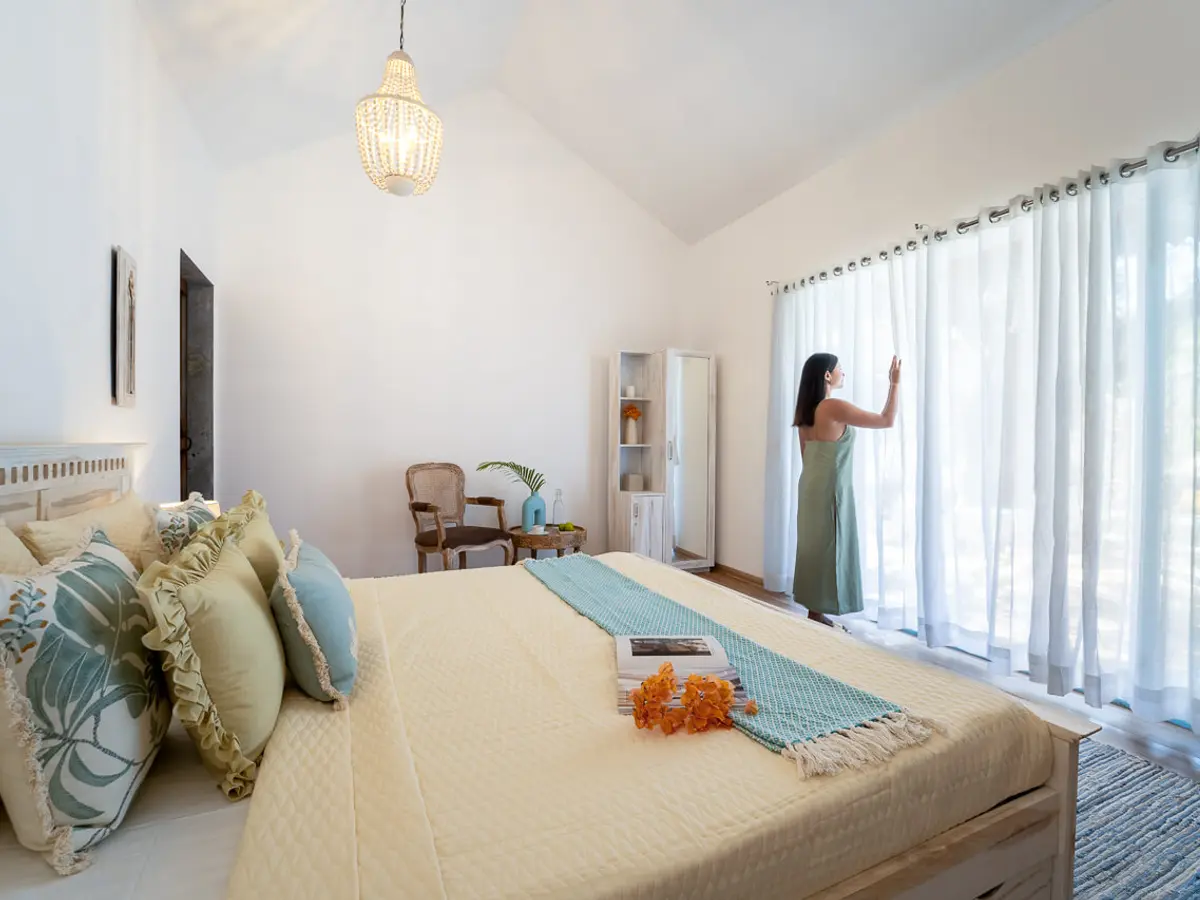 Bedroom with views | Villa Santorini in Alibaug