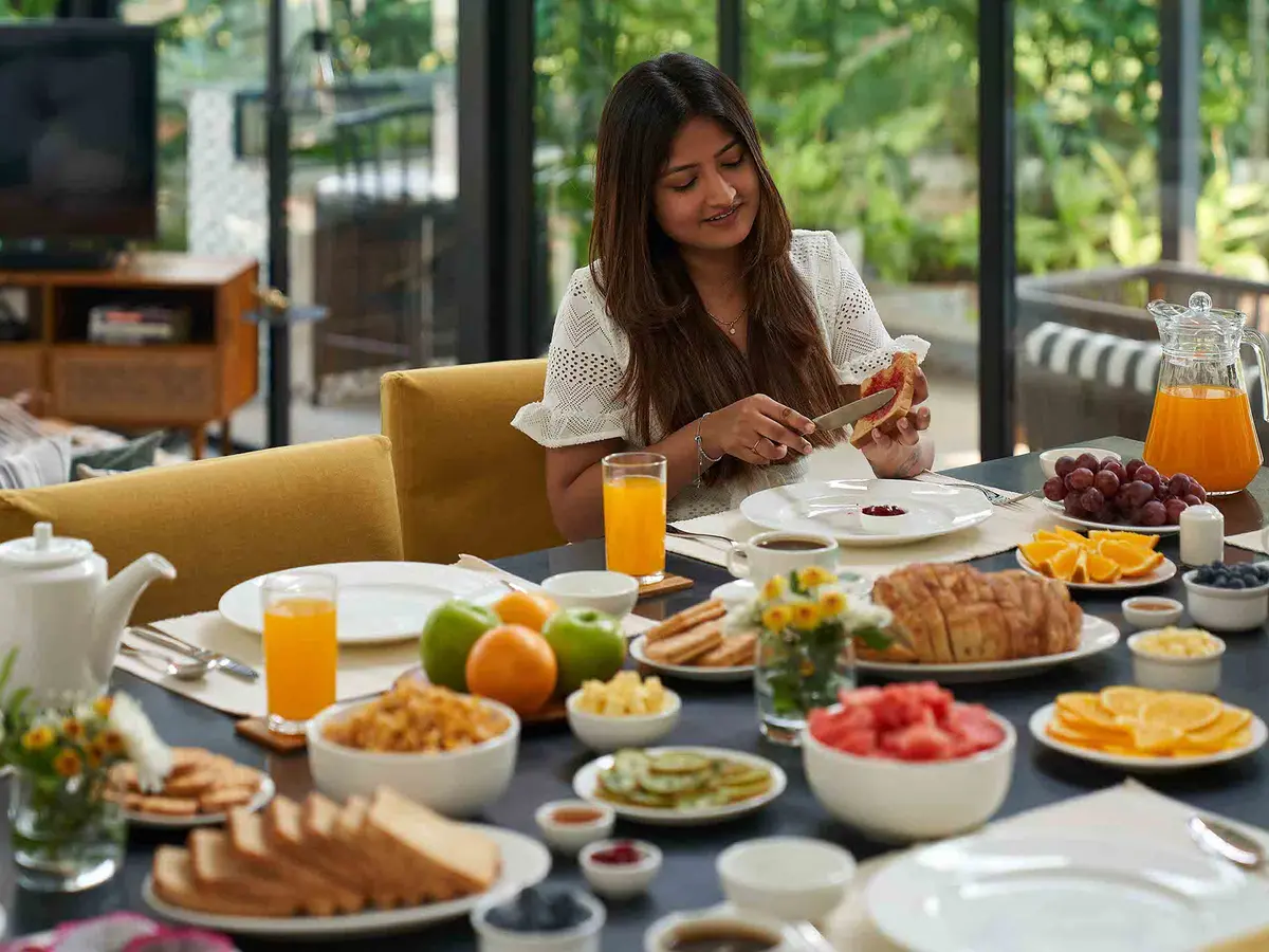 Woman eating breakfast - Sienna | Lohono Stays