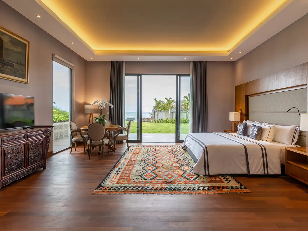 Tirtha Bayu Villa I - Deluxe Suite with seating area and garden access