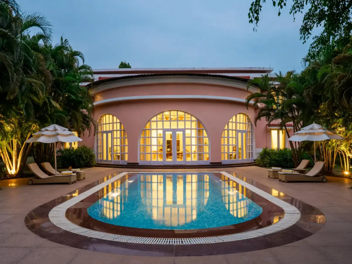 Night Poolside Facade | Villa Palladio  | Lohono Stays