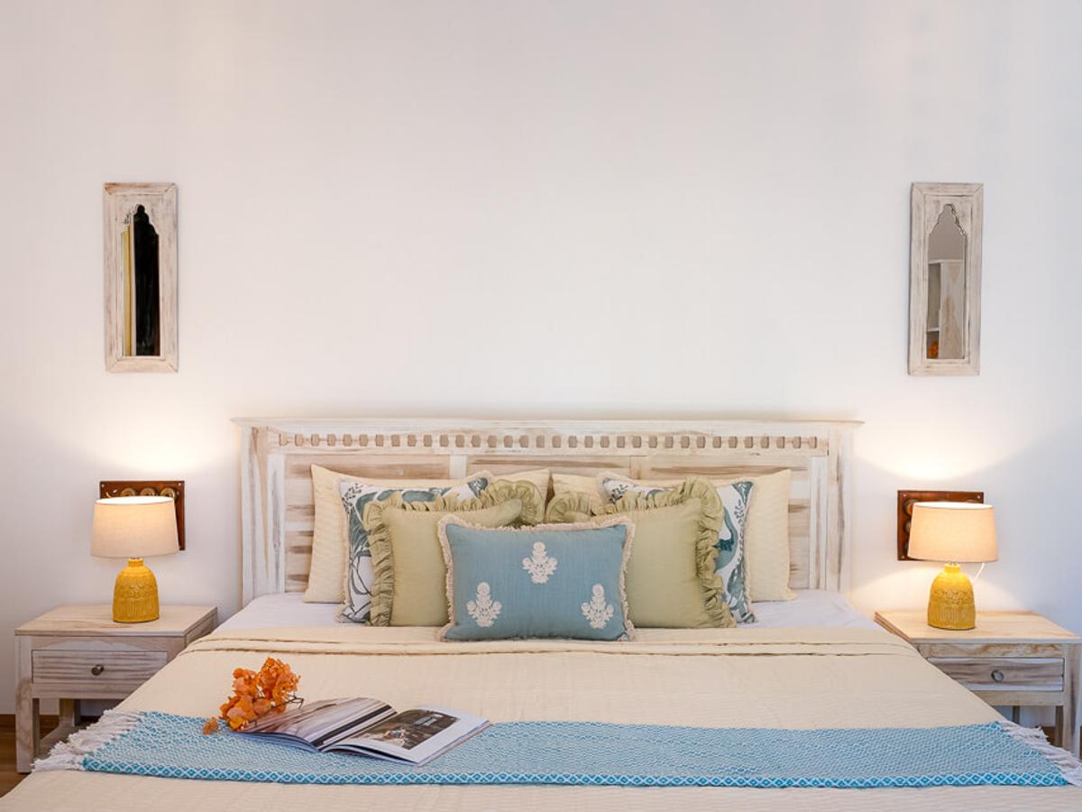 Pool-facing bedroom | Villa Santorini in Alibaug