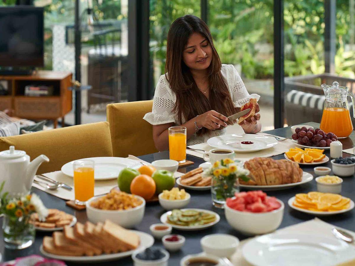 Woman eating breakfast - Sienna | Lohono Stays